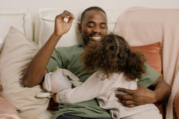 dad talking to his daughter